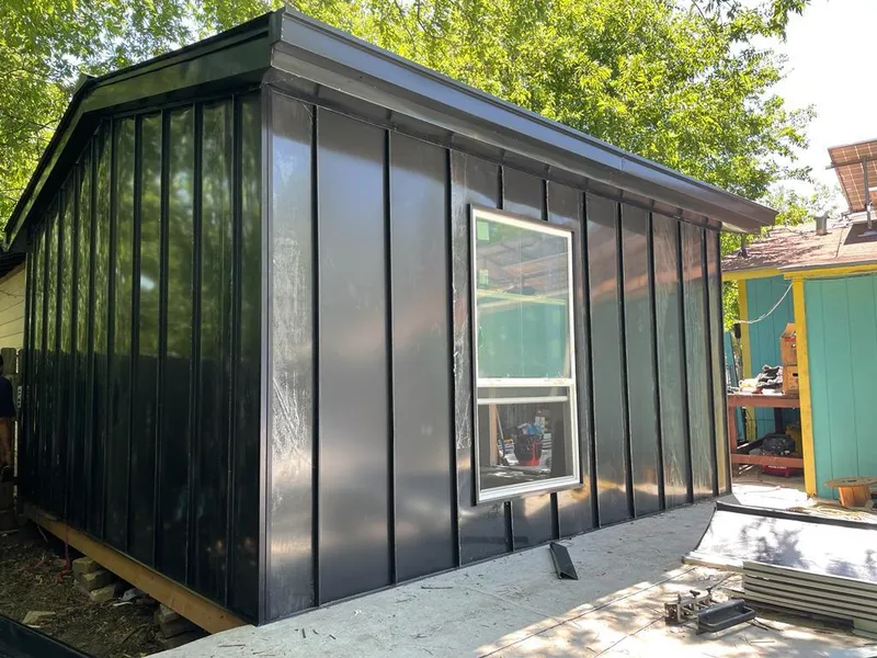 Black standing seam metal wall panels for Roof Inspection in Lakehills