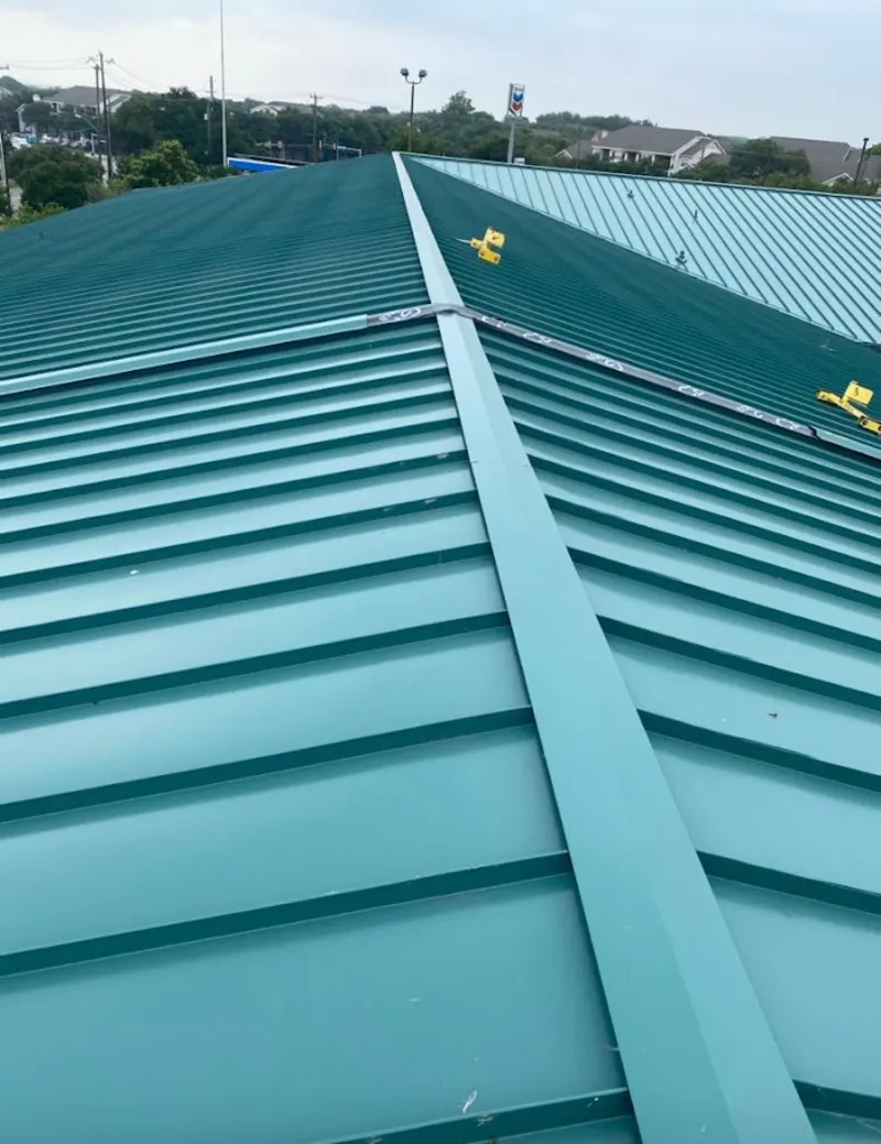 Green commercial metal roof ridge and valley for Metal Roof Repair in Lakehills