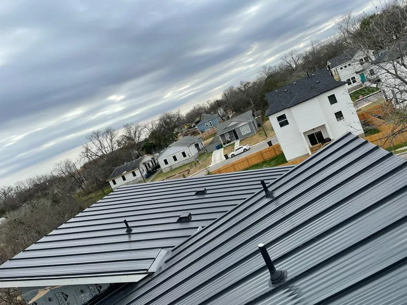 Standing seam metal roof panels with vents for Skylight Repair in Lakehills